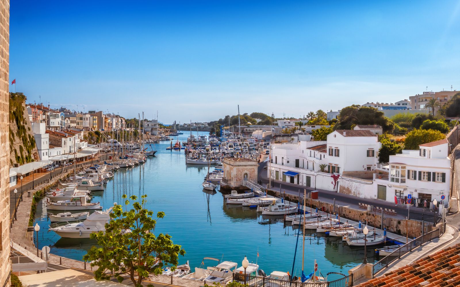 View on old town Ciutadella port on sunny day, Menorca island, Spain.