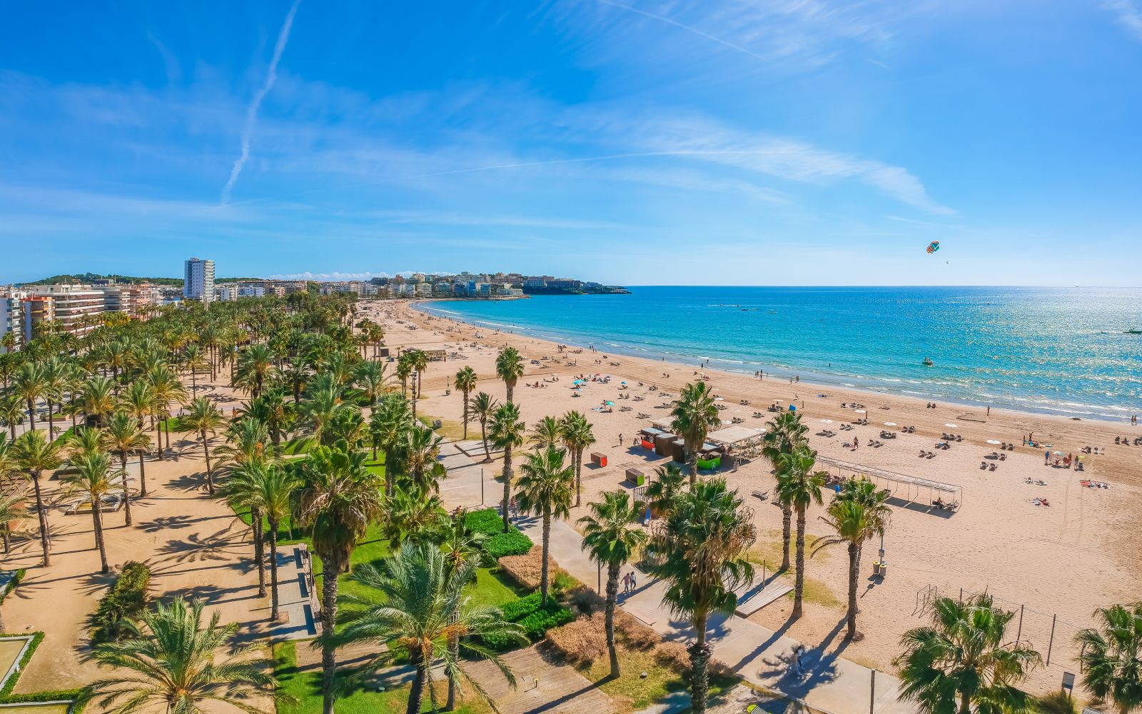 Beach in Catalan city Salou, Spain, Europe. Sea and palm in Catalonia